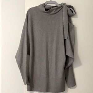 Wool blend sweater with one open shoulder